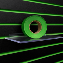 Slatwall groove inserts accent rolls installed in slatwall panels