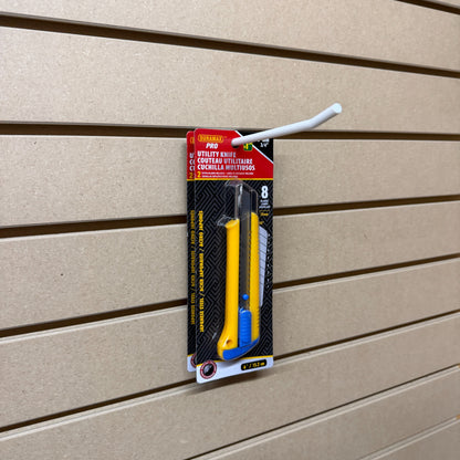 Ironleaf 6″ slatwall hook heavy duty reinforced polymer displaying utility knife packaging on slatwall.